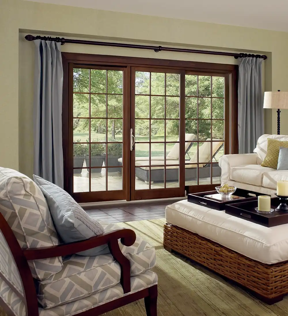 Interior view of a Marvin Replacement three-panel sliding French door with an EverWood finish