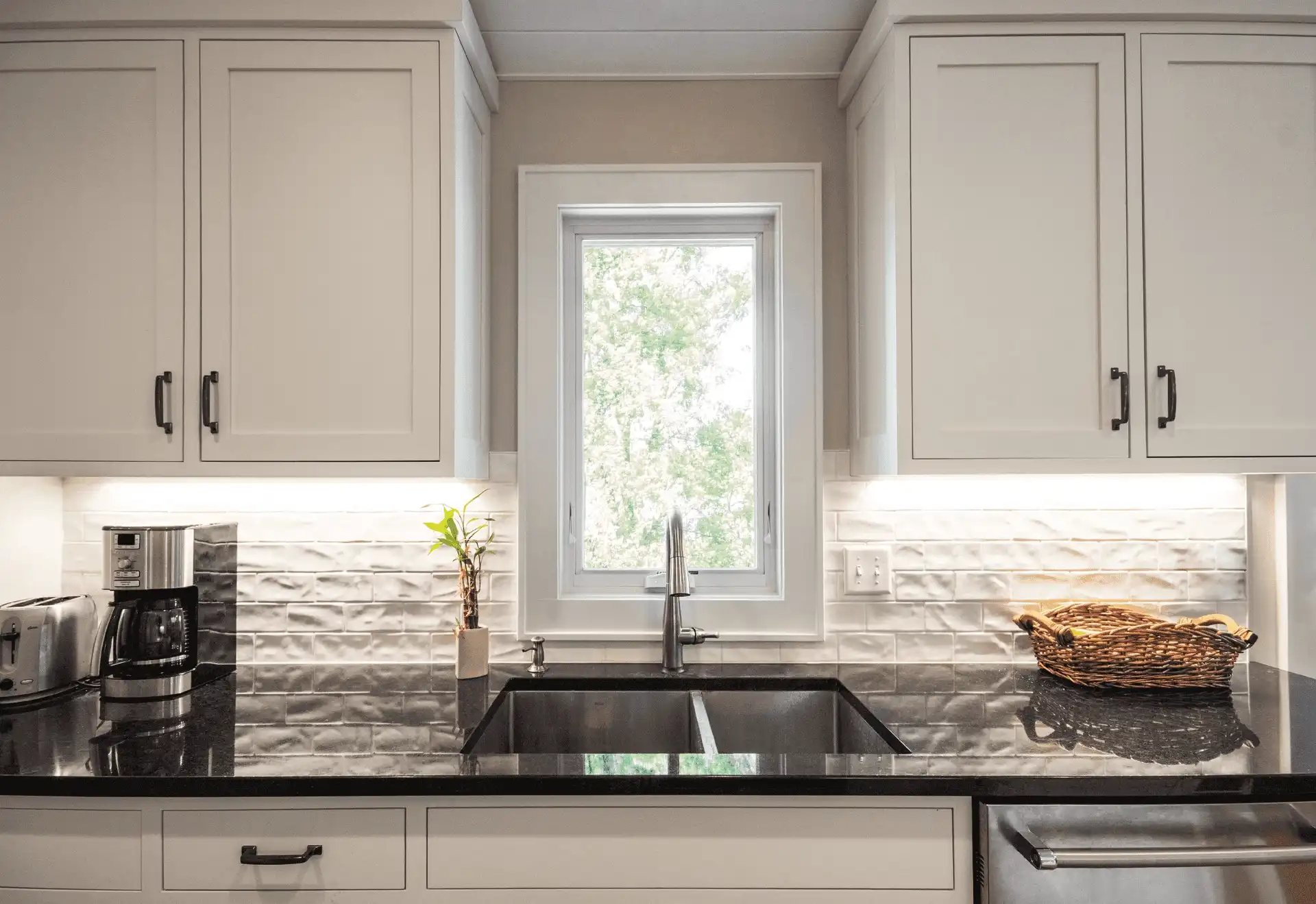 Interior kitchen image of VonHertzen house located in Chaska, MN, featuring an Infinity Awning in Stone White interior finish with White hardware.
