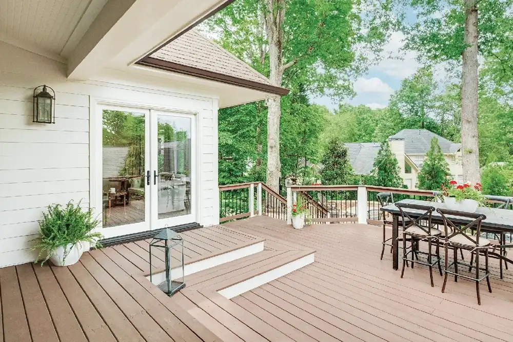 Exterior deck image featuring an Inswing French Door in Stone White exterior finish.