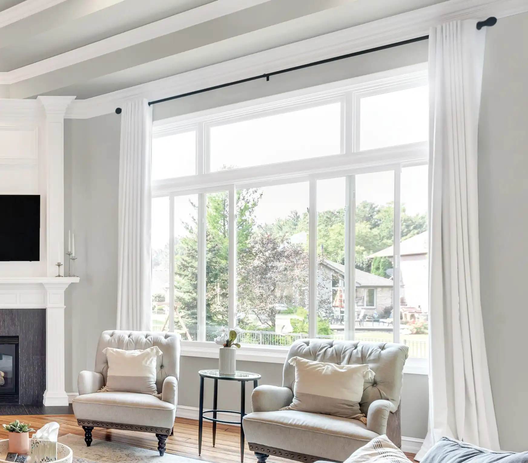 View of a living room with white Marvin Replacement Slider windows.
