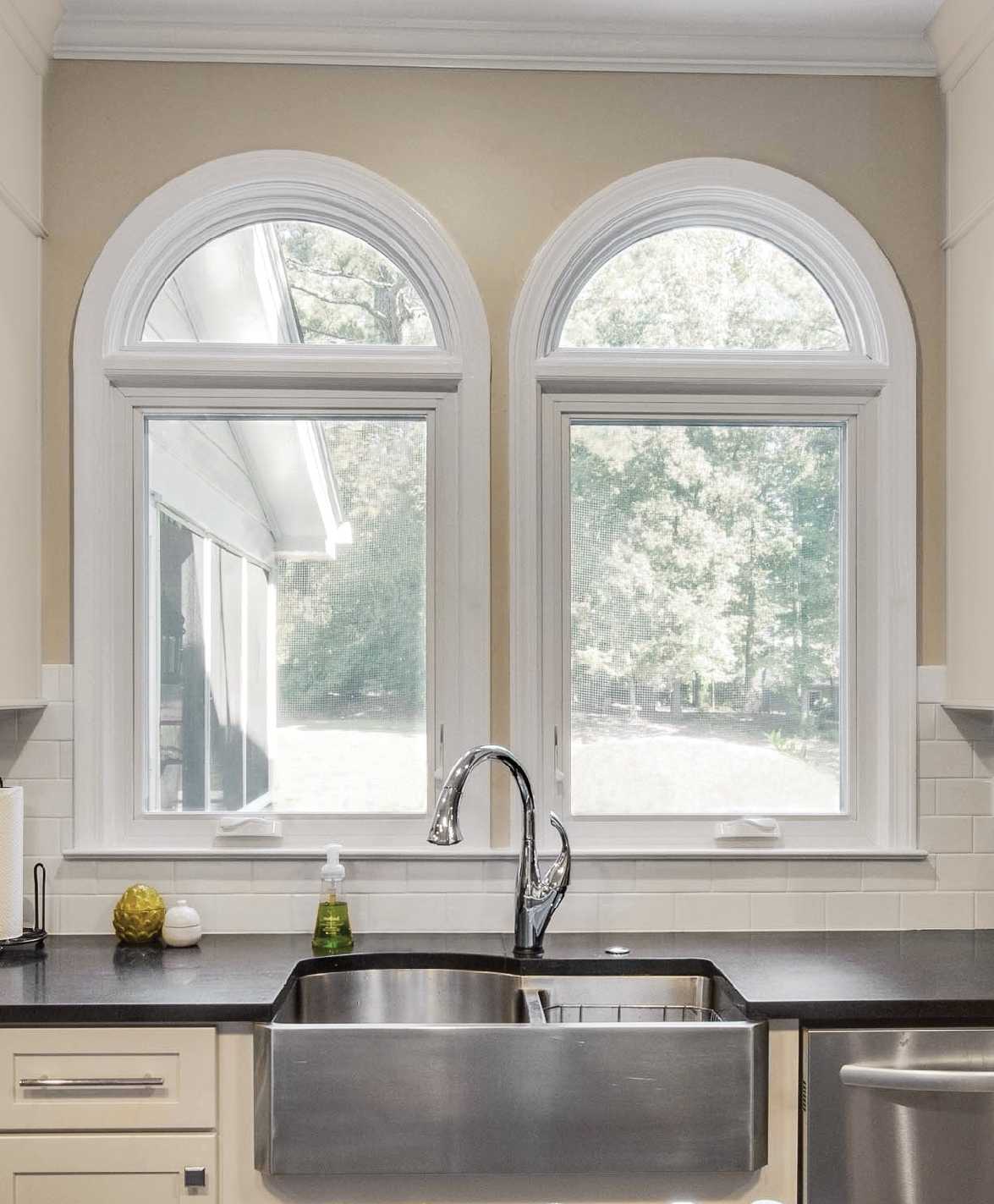 Round Top Windows and Casement Windows assembly in Stone White interior finish