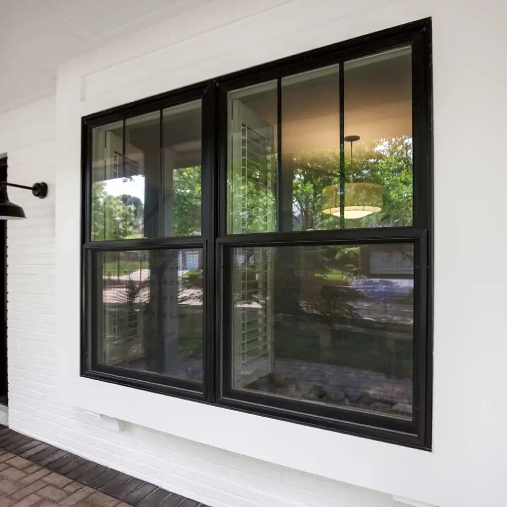 Exterior view of black single hung windows.