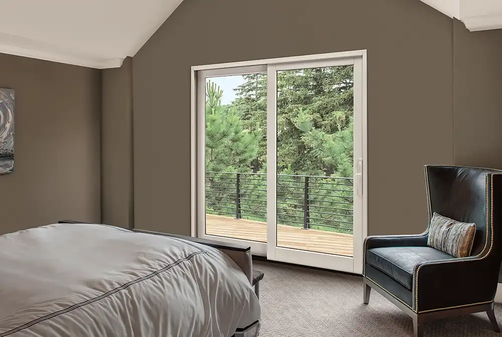 Marvin Replacement Sliding French patio door in a taupe colored bedroom