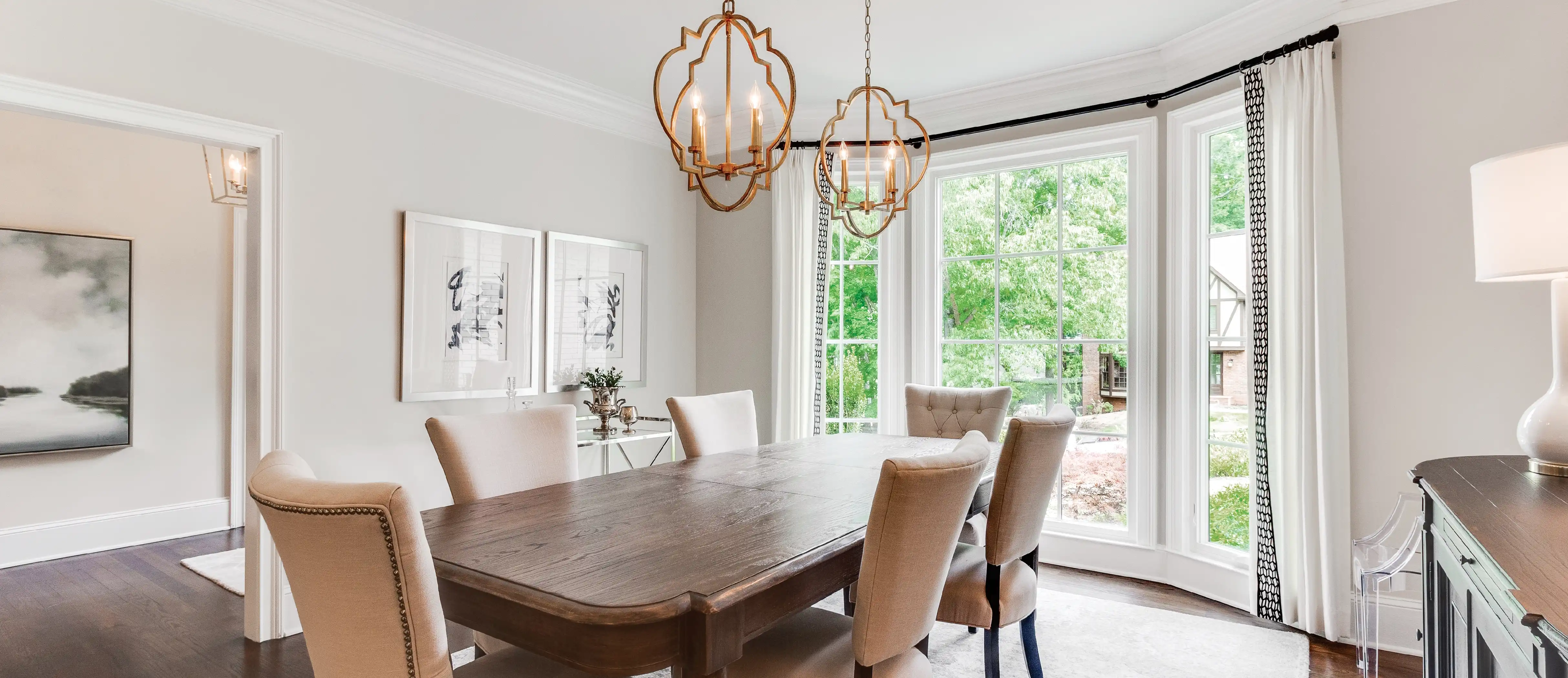 View of Marvin Replacement Casement windows in a white dining room.