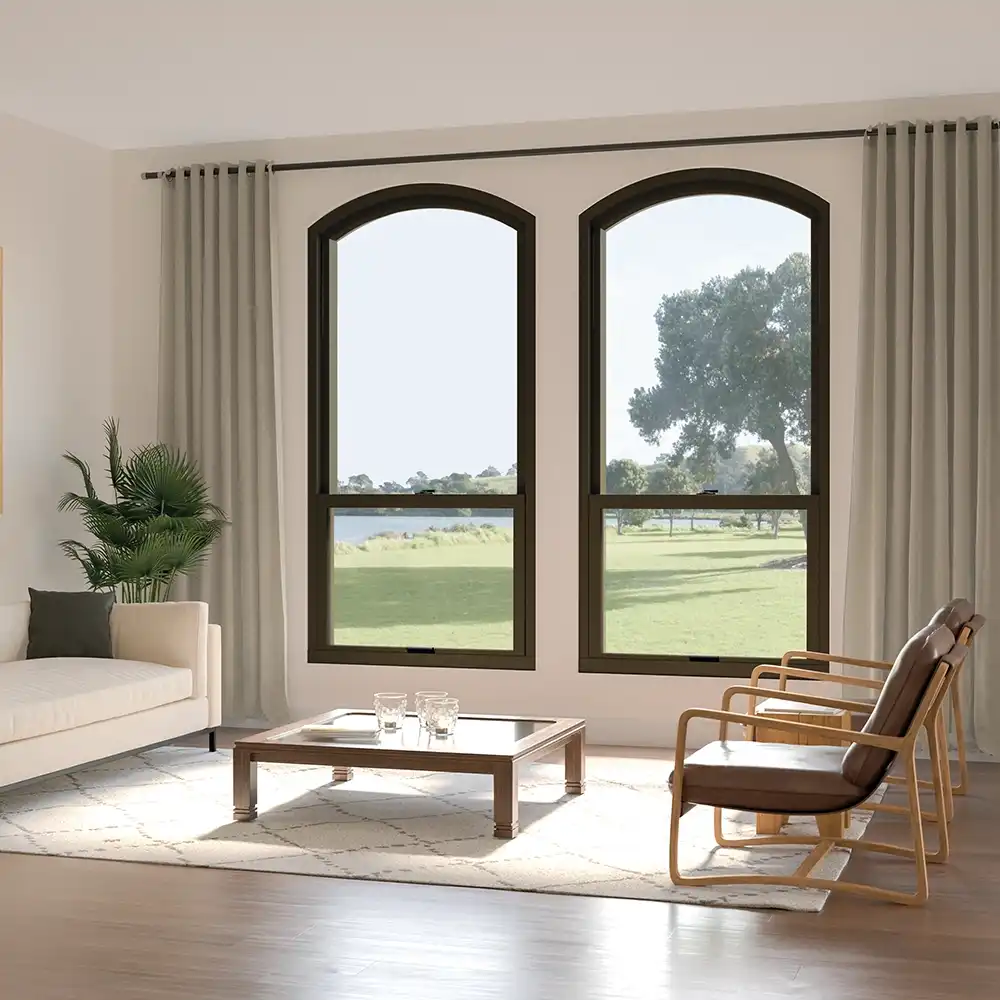 Interior living room featuring two Marvin Replacement Single Hung Round Top windows.