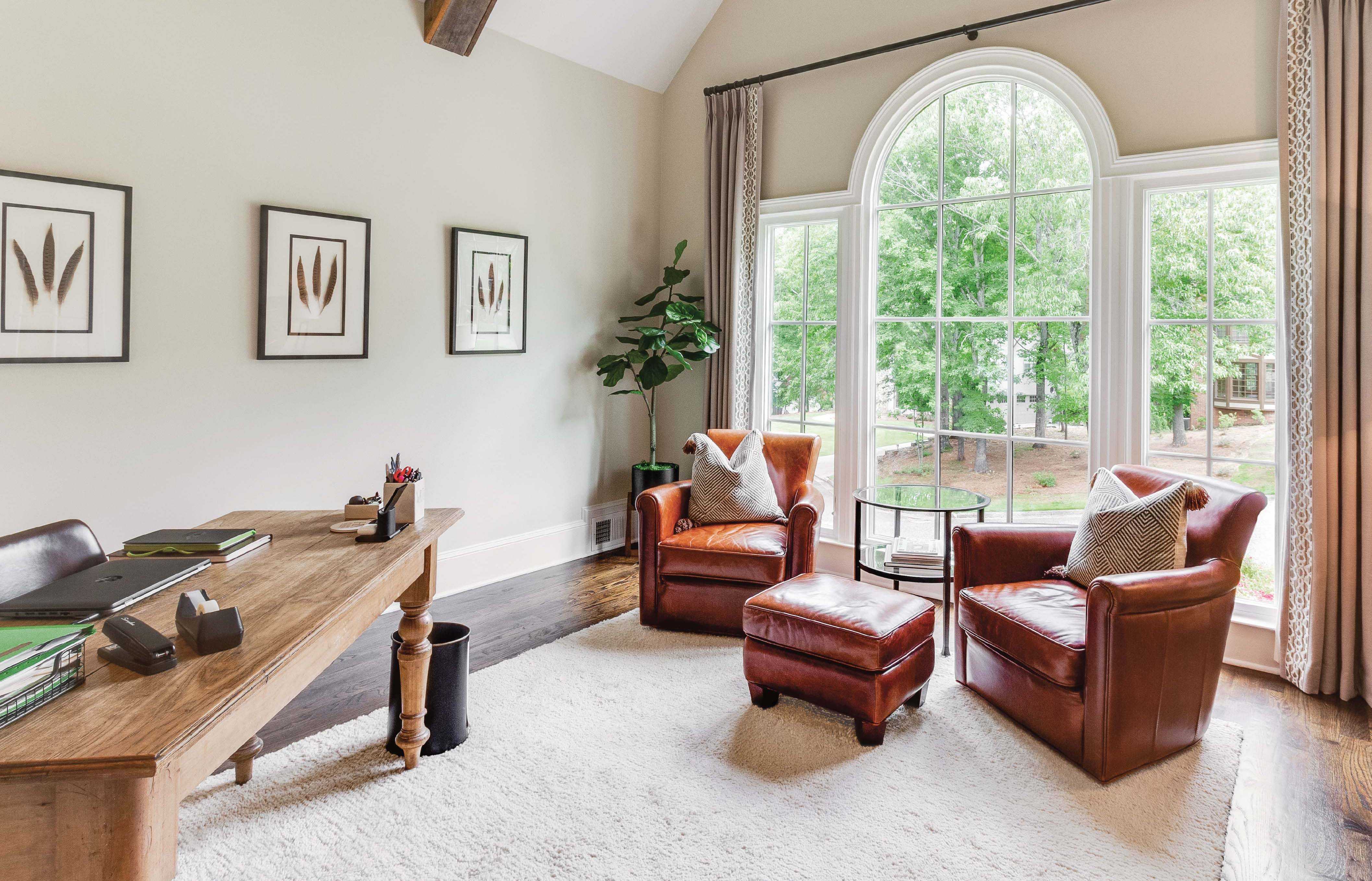 Interior family room image featuring a Round Top Window and Casement Windows in Stone White interior finish with White hardware.
