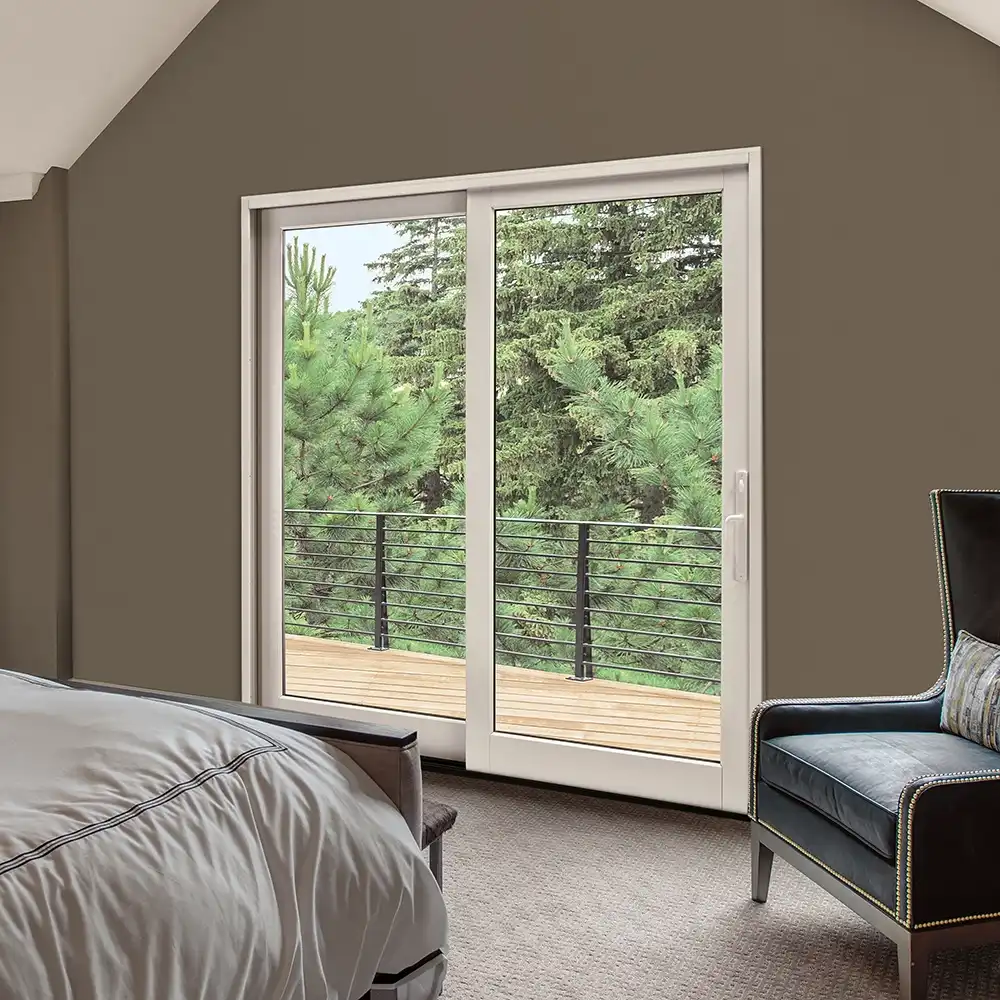 Marvin Replacement Sliding French patio door in a taupe colored bedroom.