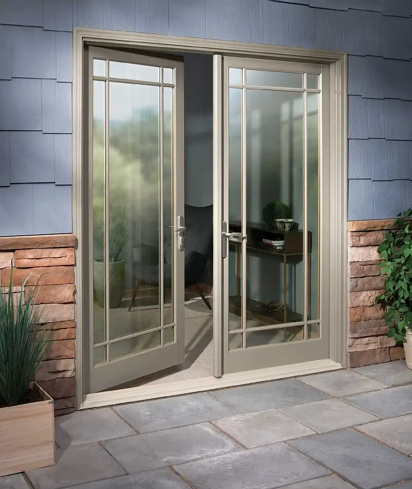 Exterior patio image featuring a 2-panel open Inswing French Door with Prairie 9-Lite Simulated Divided Lites in Pebble Gray exterior finish