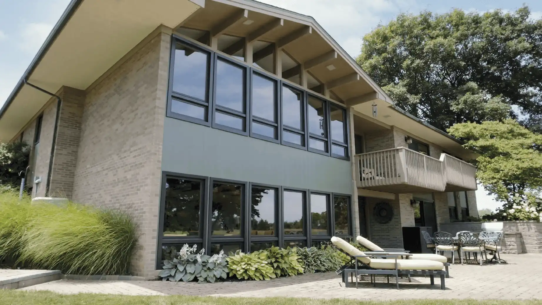 Exterior back image featuring Picture Windows in Bronze exterior finish