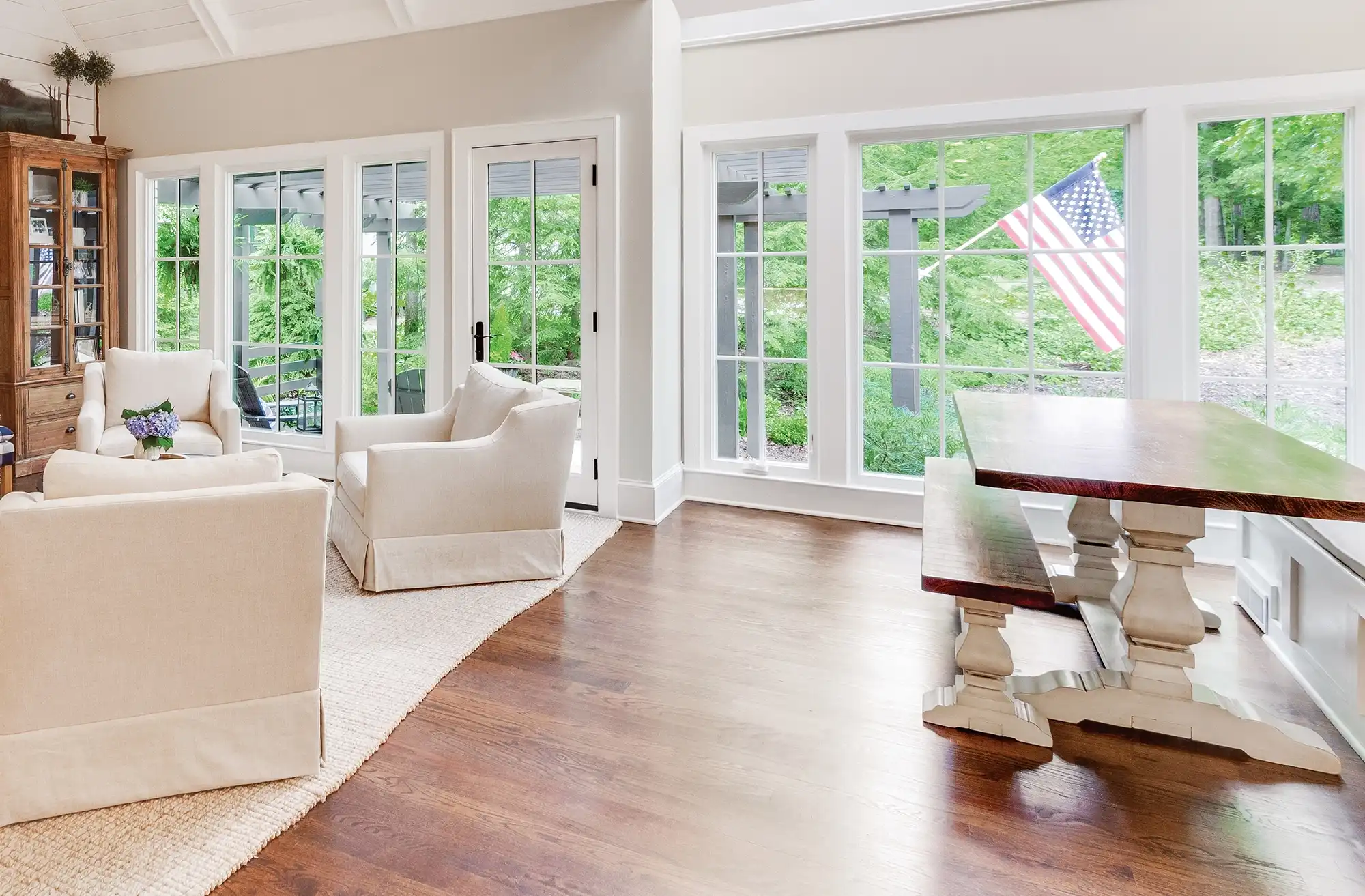 White home interior with Marvin Replacement Casement picture windows.